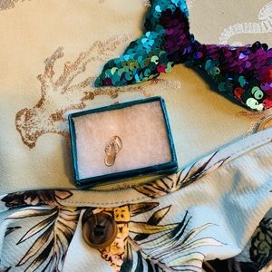 Na Hoku diamond 14 white gold Slipper pendant.